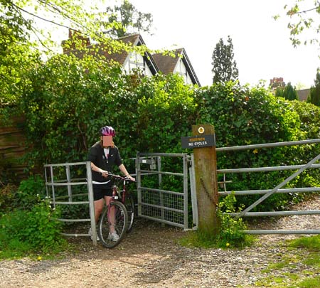 Mud, footpath, cycles and kissing gate