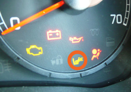 Example The seat belt warning on car dashboards in this case a Fiat Punto 