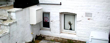 'V' sign and hand in Englefield Green, Surrey