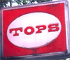 Tops logo - white oval with orange TOPS text on orange background