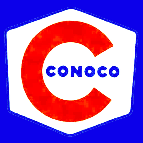 Conoco logo - European 1960s type with capital letters. Blue text, red C, in hexagon on blue background.