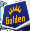 Golden logo, blue pentagon with yellow "shine" design and text