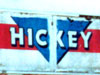 Hickey logo with blue triangle and red stripe