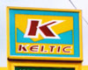 Keltic logo with maroon K on yellow and light blue background