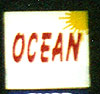 Ocean logo, red text with yellow sun