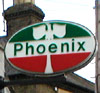 Phoenix logo, green and red with with phoenix outline